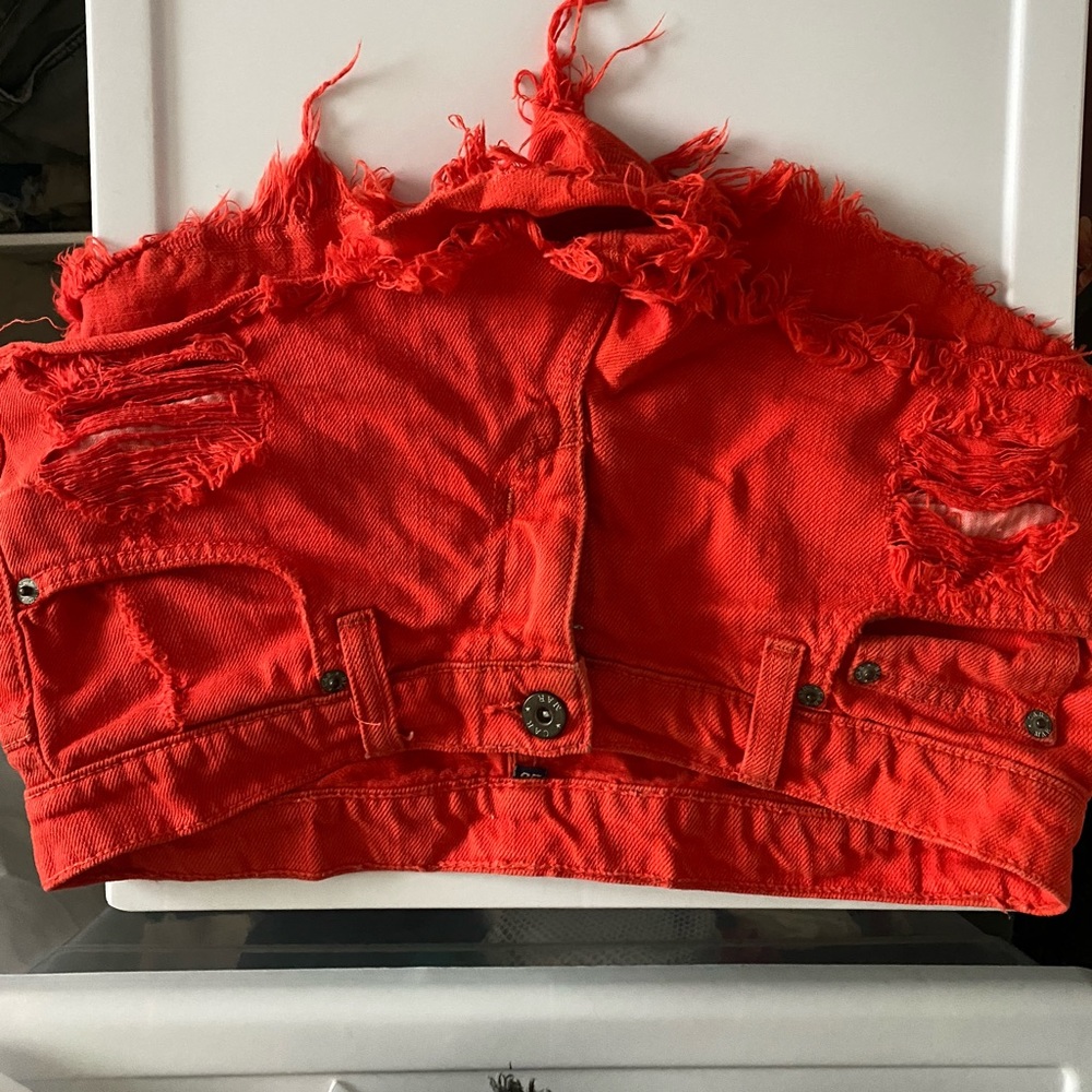 Orange cut off carmar denim shorts
